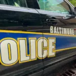 Baltimore Maryland police department sign on police cruiser BALTIMORE^ MARYLAND - JULY 29^ 2023