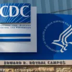 Closeup of the CDC logo seen at the Edward R. Roybal campus^ the headquarters of the Centers for Disease Control and Prevention (CDC) in Atlanta^ Georgia.