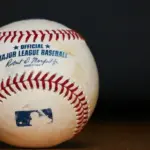Major League Baseball (MLB) Baseball on black background