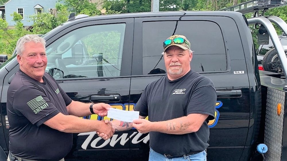 mitchell-towing-aed-donation