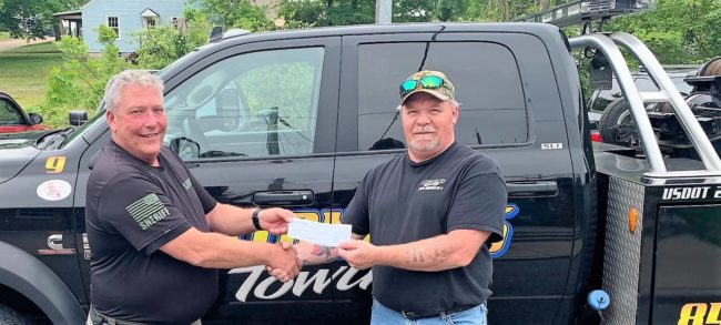 mitchell-towing-aed-donation
