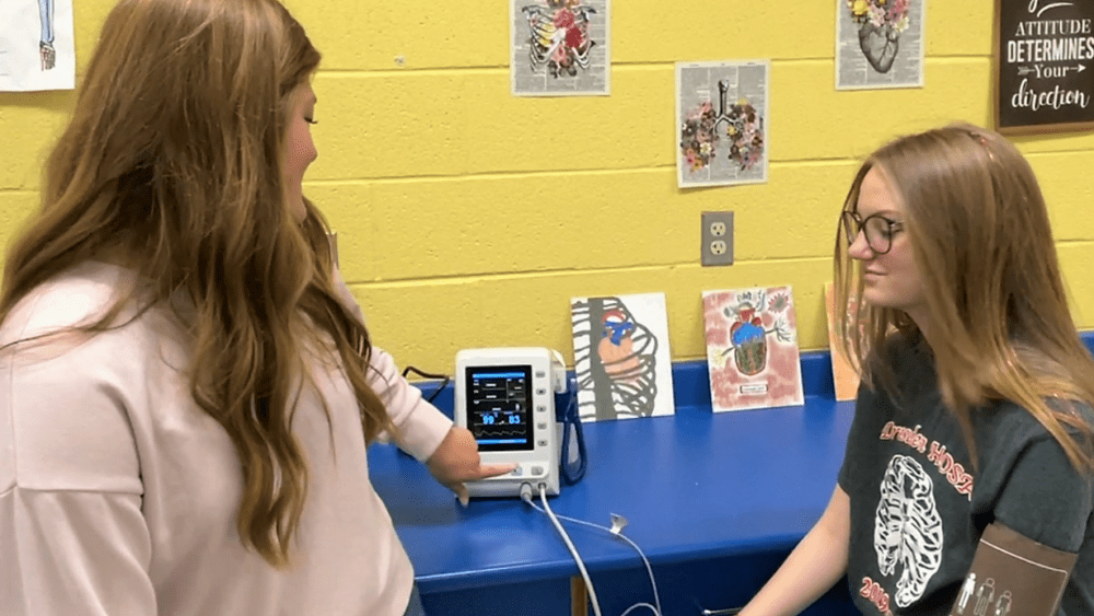 dresden-keely-mathis-checks-vital-signs-for-ellie-bush