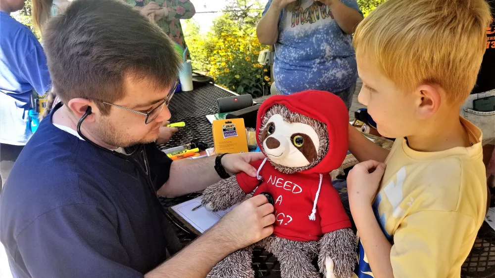 ap-stuff-animal-being-checked-2-giels