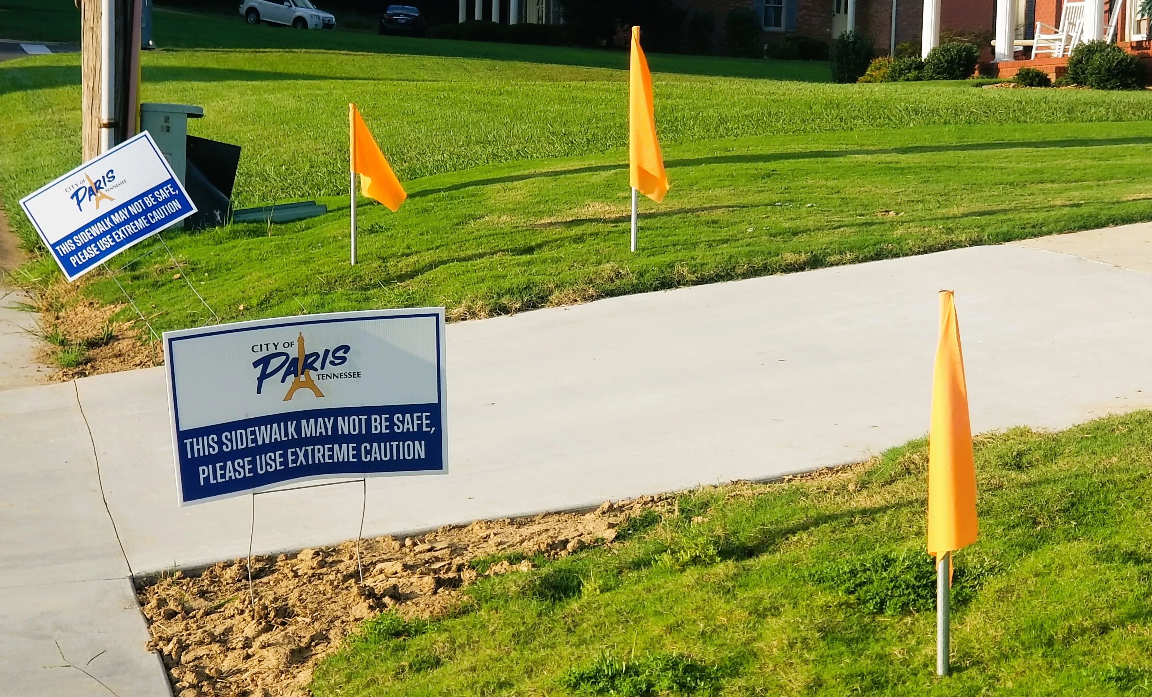 city-sidewalk-issue-volunteer