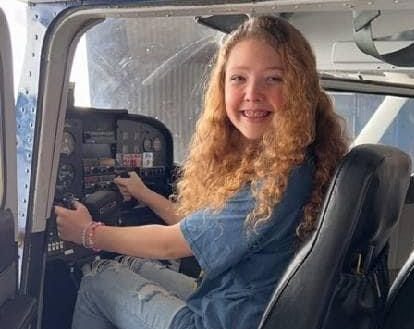 ob-kid-in-plane