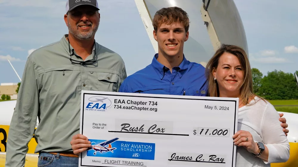 rush-cox-receive-scholarship