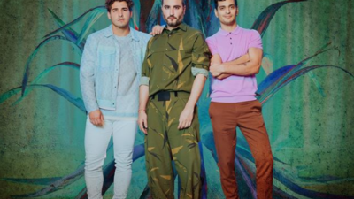 In order from left to right is Julio, Jesus and Bibi from Reik posing on "De Mexico" cover