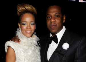 LOS ANGELES, CA - JANUARY 31: Singer Rihanna (L) and Jay-Z in the audience during the 52nd Annual GRAMMY Awards held at Staples Center on January 31, 2010 in Los Angeles, California.