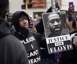 Minneapolis, MN May 29: Peaceful protesters, including Actor and comedian Nick Cannon celebrated the memory of George Floyd and demanded justice outside the Cup Foods store on Chicago Avenue in South Minneapolis where Floyd died at the hands of police.
