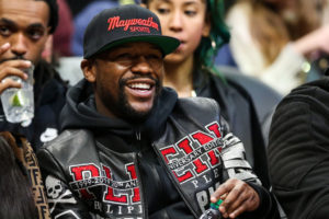 Floyd Mayweather smiling in the picture