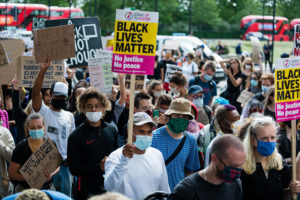 Protesters holding placards during a Black Lives Matter protest in London, following the death of George Floyd who died in police custody in Minneapolis, London, Britain, July 5, 2020.