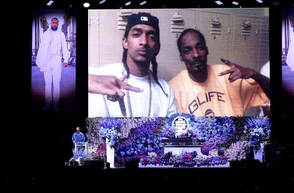 Snoop Dogg speaks onstage during Nipsey Hussle's Celebration of Life at STAPLES Center on April 11, 2019 in Los Angeles, California. Nipsey Hussle was shot and killed in front of his store, The Marathon Clothing, on March 31, 2019 in Los Angeles.