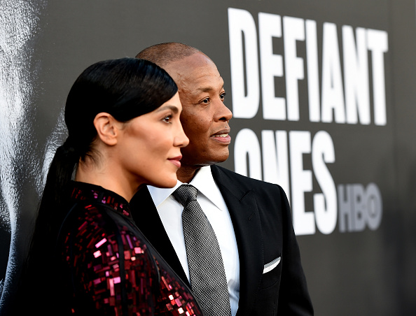 Nicole Young (L) and producer Dr. Dre arrive at the premiere screening of HBO's "The Defiant Ones" at Paramount Studios on June 22, 2017 in Los Angeles, California.