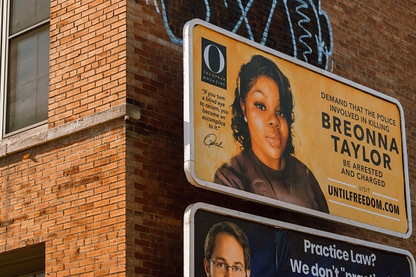 A billboard featuring a picture of Breonna Taylor and calling for the arrest of police officers involved in her death is seen on August 11, 2020 in Louisville, Kentucky. Oprah Winfrey’s O Magazine sponsored the campaign featuring 26 billboards, one for every year Taylor was alive, across the city of Louisville where she died. Taylor was killed by Louisville Metro Police Department officers in a no-knock raid on March 13 when gunfire erupted.