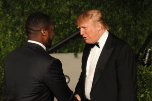 50 Cent and Donald Trump arrive at the Vanity Fair Oscar party hosted by Graydon Carter held at Sunset Tower on February 27, 2011 in West Hollywood, California.