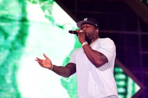 US rapper 50 Cent performs on stage during the Jeddah World music Festival on July 18, 2019, at the King Abdullah Sports City in the coastal city of Jeddah. - US Pop icon Janet Jackson and US rapper 50 Cent are among musicians set to perform in Saudi Arabia, organisers said, after US rapper Nicki Minaj pulled out in a show of support for women's rights.