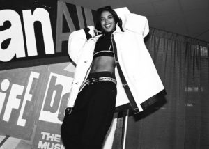 NEW YORK - OCTOBER 5: American R&B singer Aaliyah, aka Aaliyah Dana Houghton (1979-2001) poses for a photo backstage at Madison Square Garden for Lifebeat's Urban Aid benefit concert on October 5, 1995 in New York City, New York.
