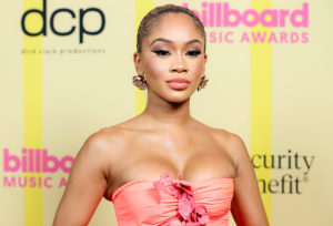 LOS ANGELES, CALIFORNIA - MAY 23: In this image released on May 23, Saweetie poses backstage for the 2021 Billboard Music Awards, broadcast on May 23, 2021 at Microsoft Theater in Los Angeles, California.