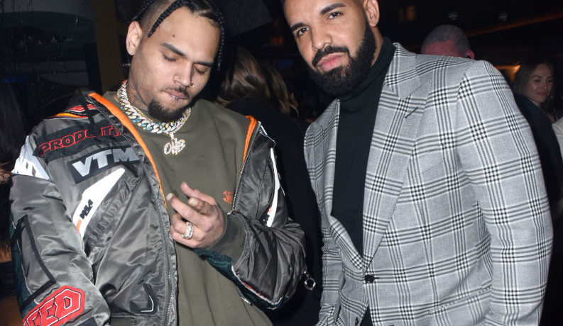 LOS ANGELES, CA - DECEMBER 31: Chris Brown and Drake attend The Mod Sèlection Champagne New Years Party Hosted By Drake And John Terzian at Delilah on December 31, 2018 in Los Angeles, California.