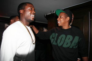 Meek Mill and Jay-Z attend the Premiere Of NBA 2K13 With Cover Athletes And NBA Superstars at 40 / 40 Club on September 26, 2012 in New York City.