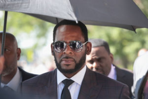 CHICAGO, ILLINOIS - JUNE 26: R&B singer R. Kelly leaves the Leighton Criminal Courts Building following a hearing on June 26, 2019 in Chicago, Illinois. Prosecutors turned over to Kelly's defense team a DVD that alleges to show Kelly having sex with an underage girl in the 1990s. Kelly has been charged with multiple sex crimes involving four women, three of whom were underage at the time of the alleged encounters.