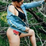 KLBJ Rock Girl Dominique: Miss KLBJ Rock Girl Dominique rose leg tattoo