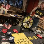 Emily holding down the KLBJ FM swag table: Emily holding down the KLBJ FM swag table