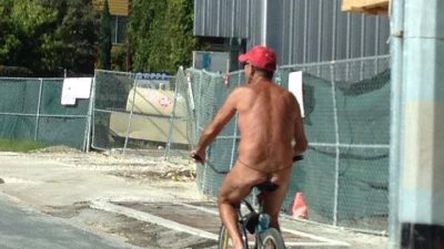 nude man on bike