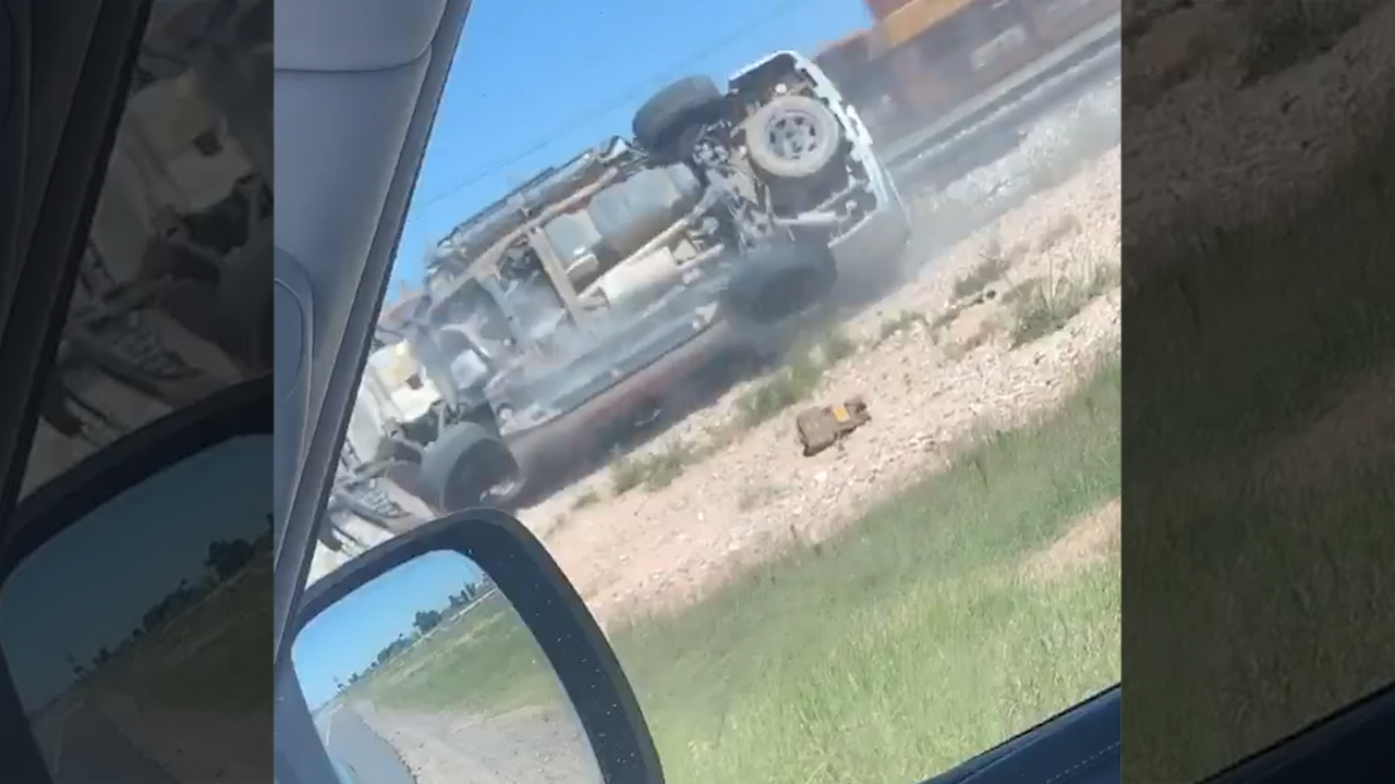 Train Hits Police Car in Midland KLBJ Austin, TX
