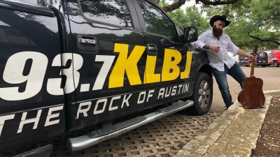 Truck and a man in a cowboy hat