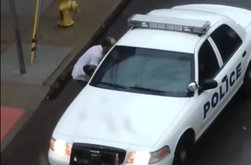 Drunk Dude Climbs Into Police Car | KLBJ - Austin, TX