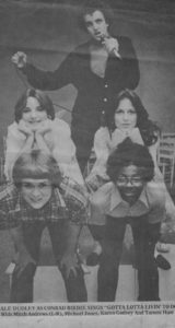 Several young actors pose in black and white