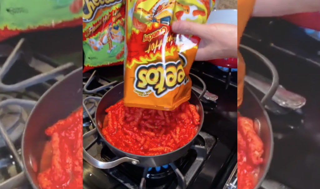 boiling a bag of flaming hot Cheetos