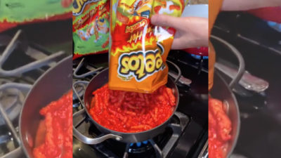 boiling a bag of flaming hot Cheetos