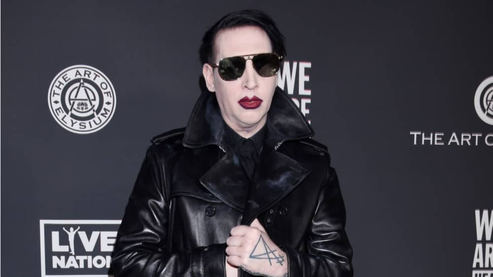 Marilyn Manson agrees to turn himself into police on assault charges ...