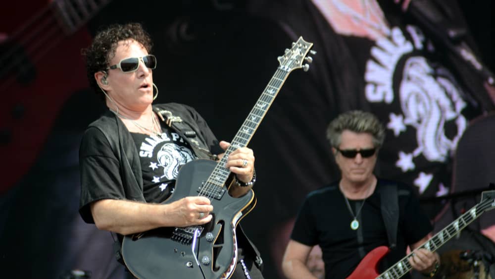 Neal Schon of Journey performs during a concert Saturday Aug. 6