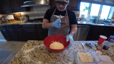 Bob Fonseca makes pizza dough