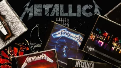 CDs of the heavy metal group Metallica over on a T-shirt with the Metallica logo. Illustrative editorial Leon-Spain-12 March 2024