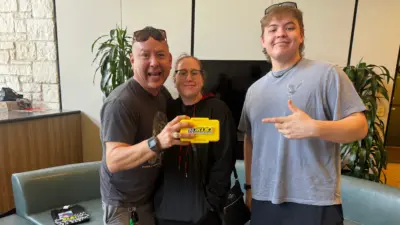 Prize box #3 winners with KLBJ box