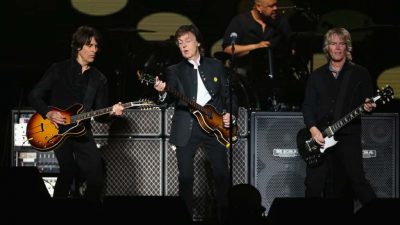 This is photo of Paul McCartney Reforming with his band in 2018