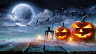 jackolanternsglowingatmoonlightinthespookynight