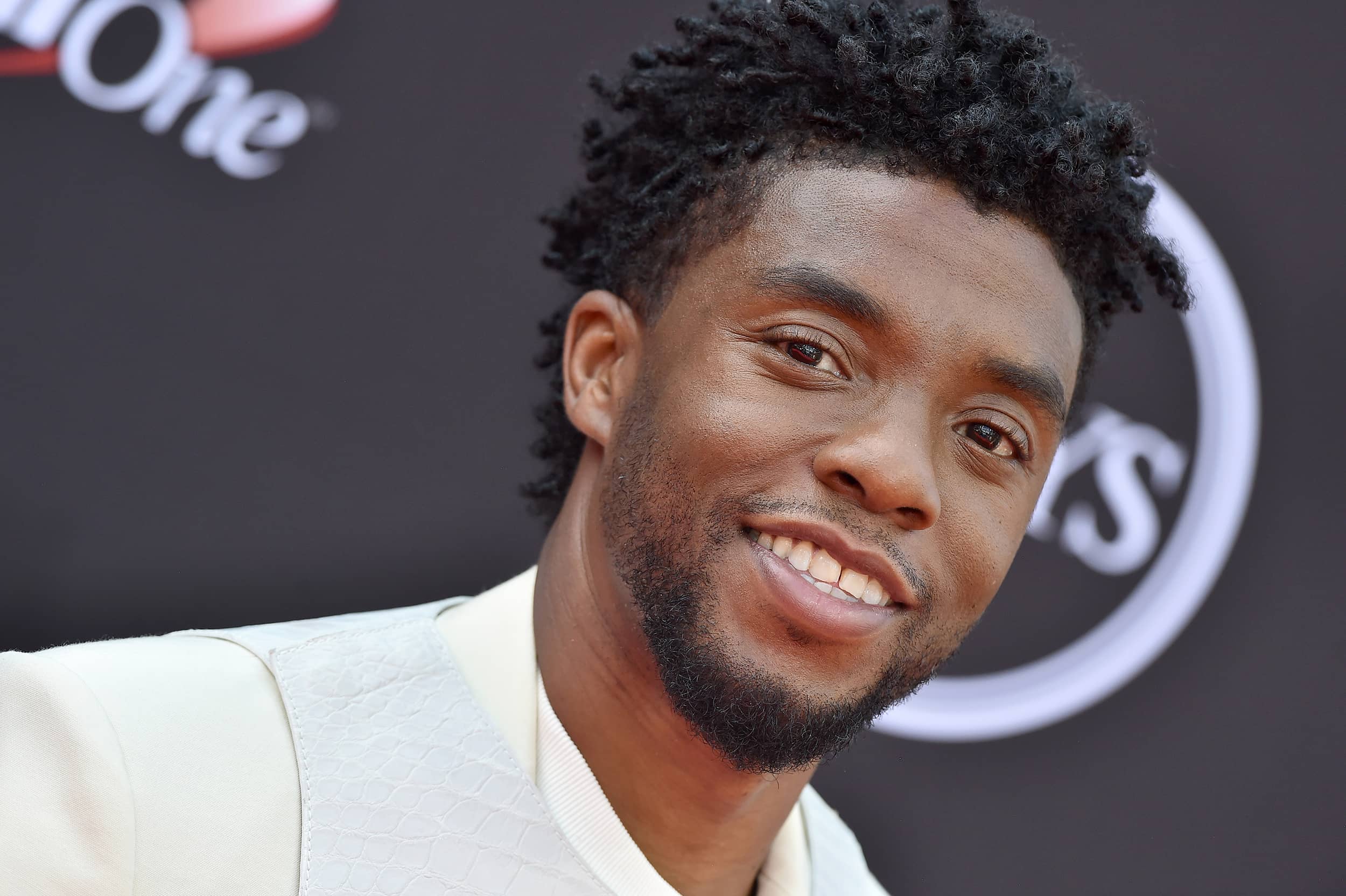 Chadwick Boseman smiles