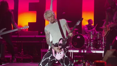 Machine Gun Kelly performs on stage at the Audacy Beach Festival. FORT LAUDERDALE^ FLORIDA - DECEMBER 4^ 2022