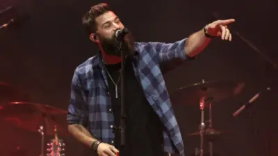 Jordan Davis performs at CMT's RAMJAM on June 3^ 2019 at TopGolf in Nashville^ Tennessee. NASHVILLE^ TN - JUN 3: