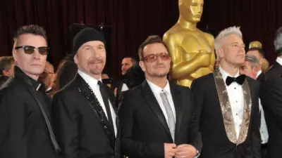 U2 with Bono & The Edge at the 86th Annual Academy Awards at the Hollywood & Highland Theatre^ Hollywood. LOS ANGELES^ CA - MARCH 2^ 2014