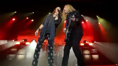 Jeff Keith (L) and Frank Hannon of Tesla perform onstage at the Paramount on October 25^ 2018 in Huntington^ New York.