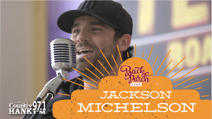 Jackson Michelson singing into microphone