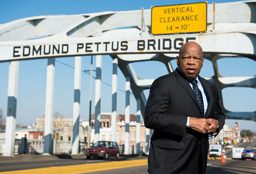 UNITED STATES - FEBRUARY 14: Rep. John Lewis, D-Ga., stands on the Edmund Pettus Bridge in Selma, Ala., in between television interviews on Feb. 14, 2015. Rep. Lewis was beaten by police on the bridge on "Bloody Sunday" 50 years ago on March 7, 1965, during an attempted march for voting rights from Selma to Montgomery.