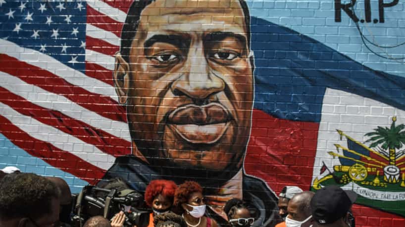 NEW YORK, NY - JULY 13: A mural painted by artist Kenny Altidor depicting George Floyd is unveiled on a sidewall of CTown Supermarket on July 13, 2020 in the Brooklyn borough New York City. George Floyd was killed by a white police officer in Minneapolis and his death has sparked a national reckoning about race and policing in the United States.