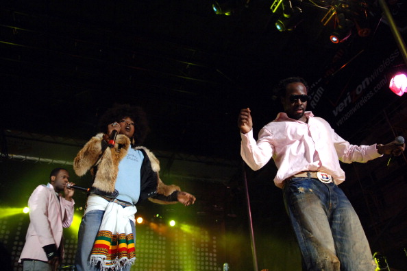 Lauryn Hill and Wyclef Jean of the Fugees during Verizon Wireless V CAST Reunites the Fugees With Outdoor Concert on Hollywood and Vine at Hollywood and Vine in Hollywood, California, United States.